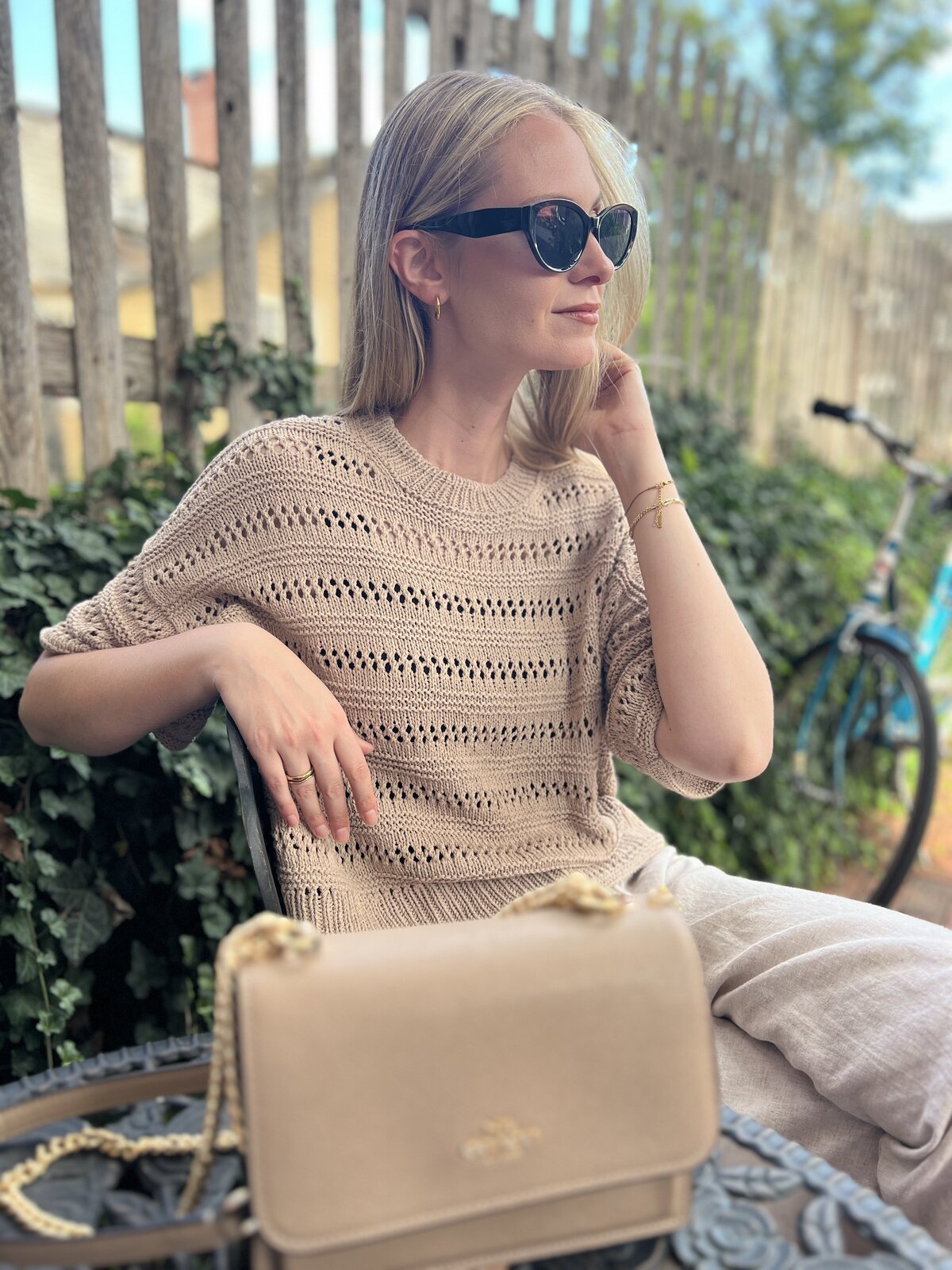 Lexie from Lexie Dane Knits wearing her recent FO, Lacey Loop Tee