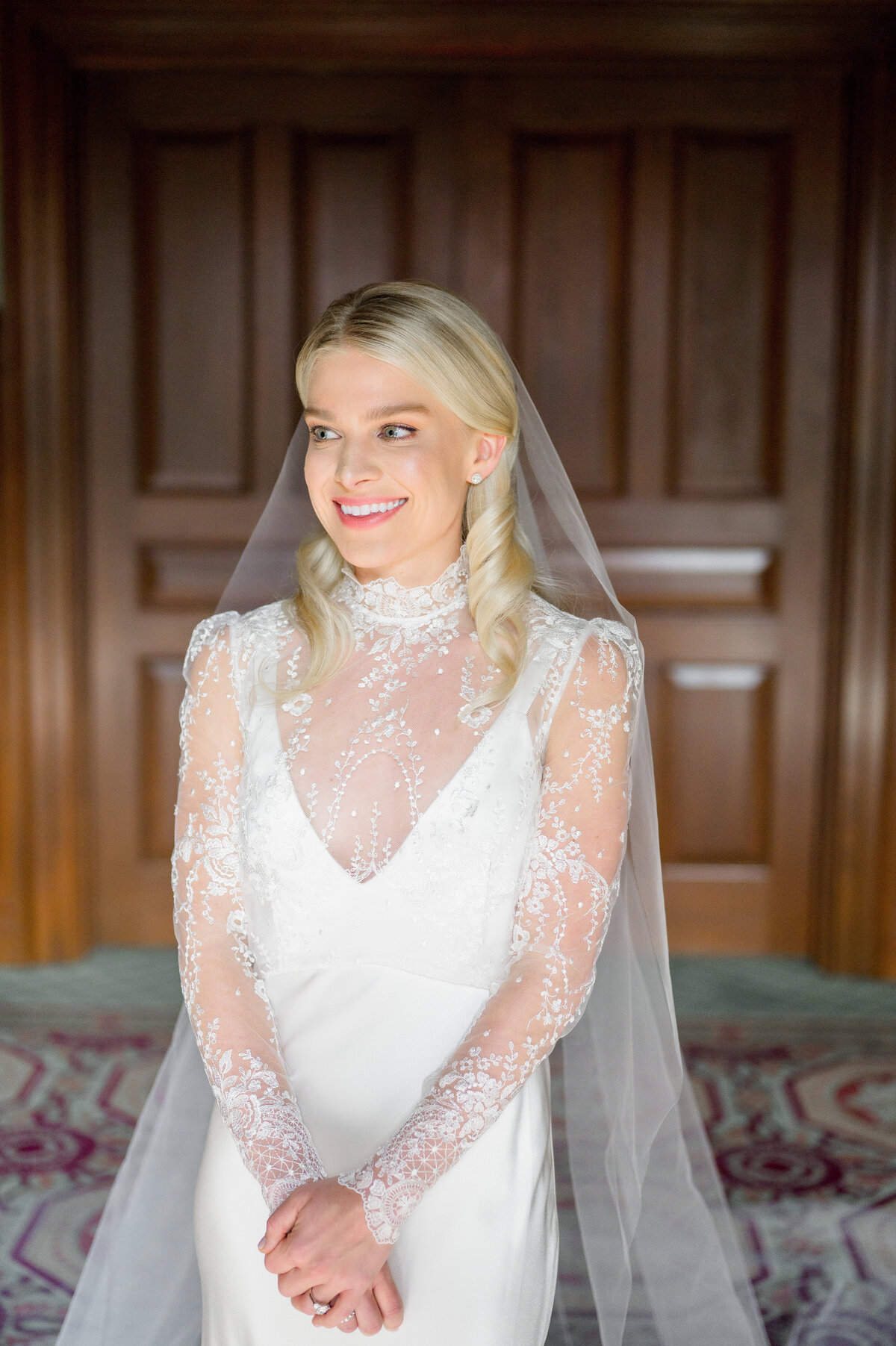 bride with lace gown in wedding photo at duquesne club