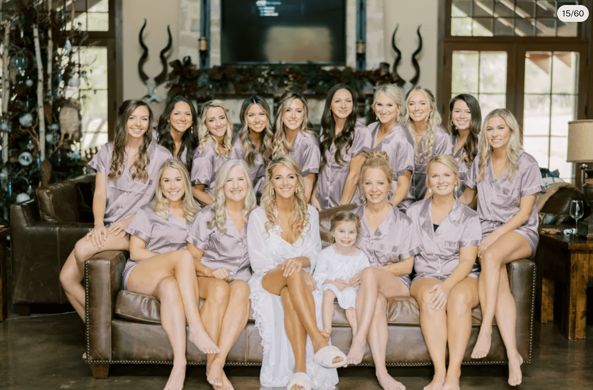 San Antonio bride with full wedding party after receiving hair styling, makeup, and nail salon services before the ceremony