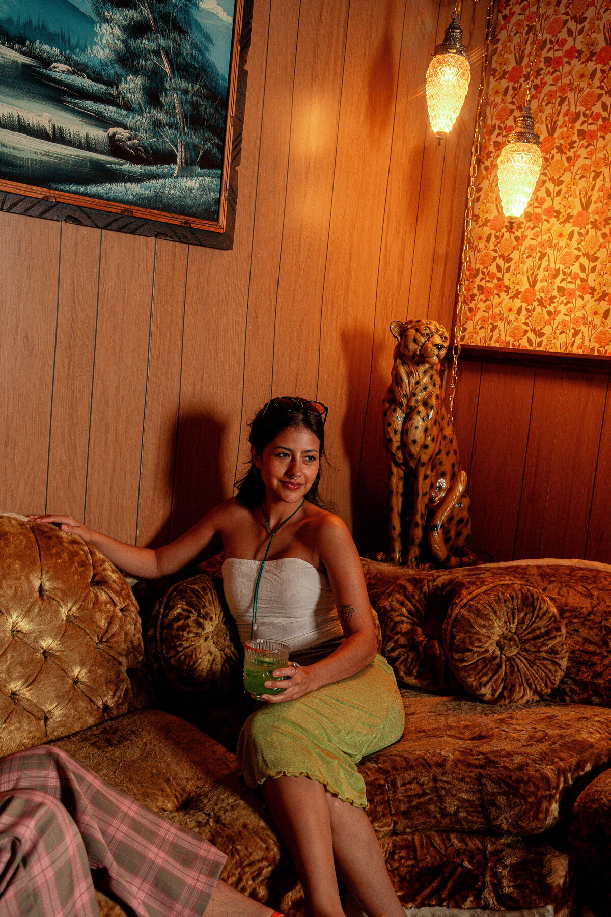 Travel and Leisure photography in Asheville, NC featuring model with a green cocktail at Daytrip