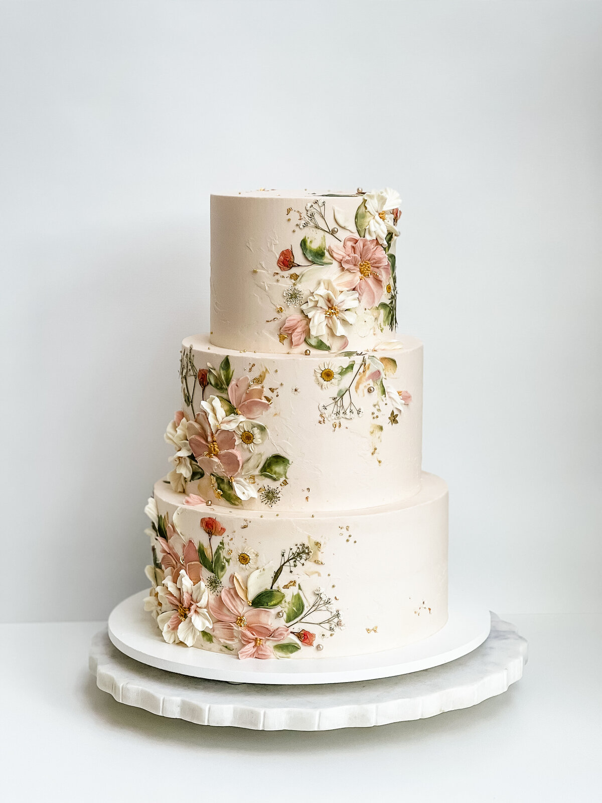 buttercream pressed flower wedding cake