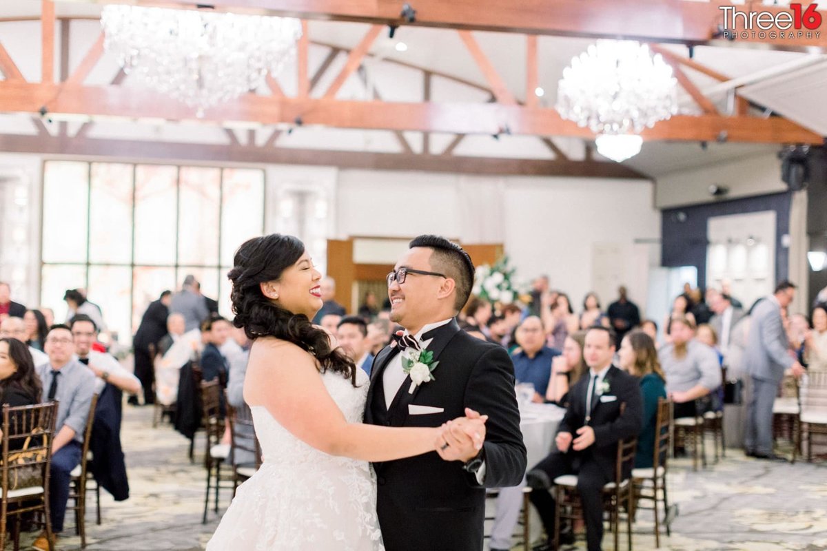 Bride and Groom share their first dance together
