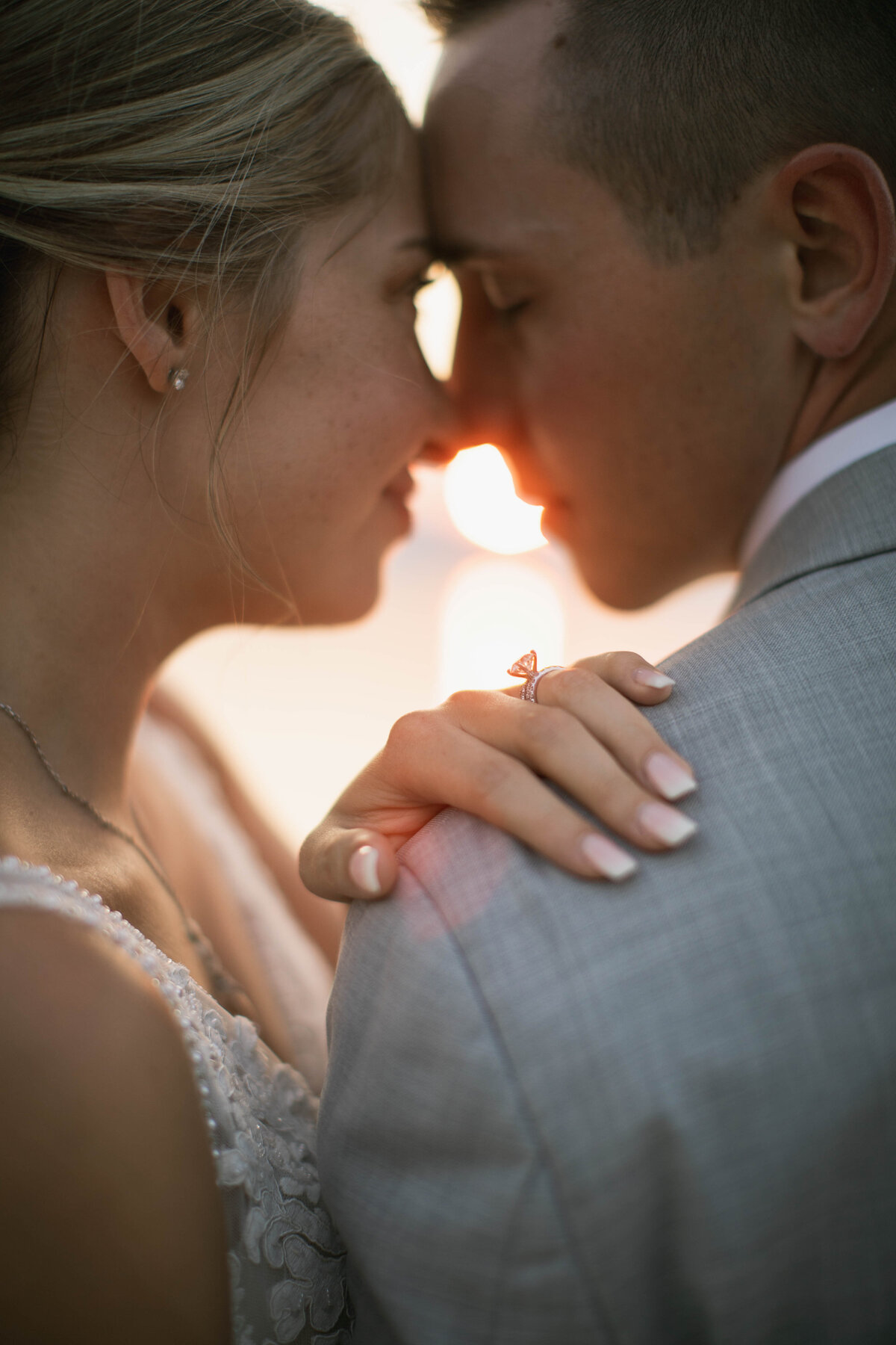 jayde & philip wedding photography - bride's hand on groom's shoulder