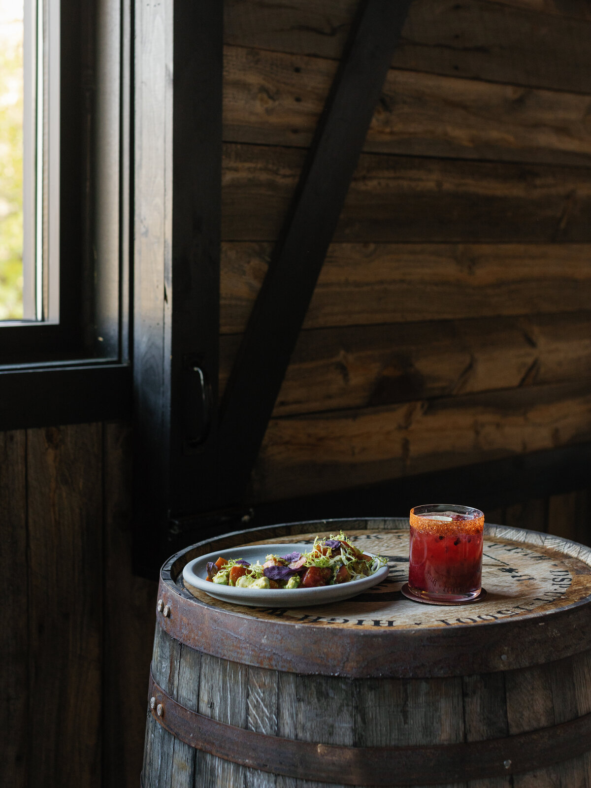 food-and-cocktail-on-wooden-barrel
