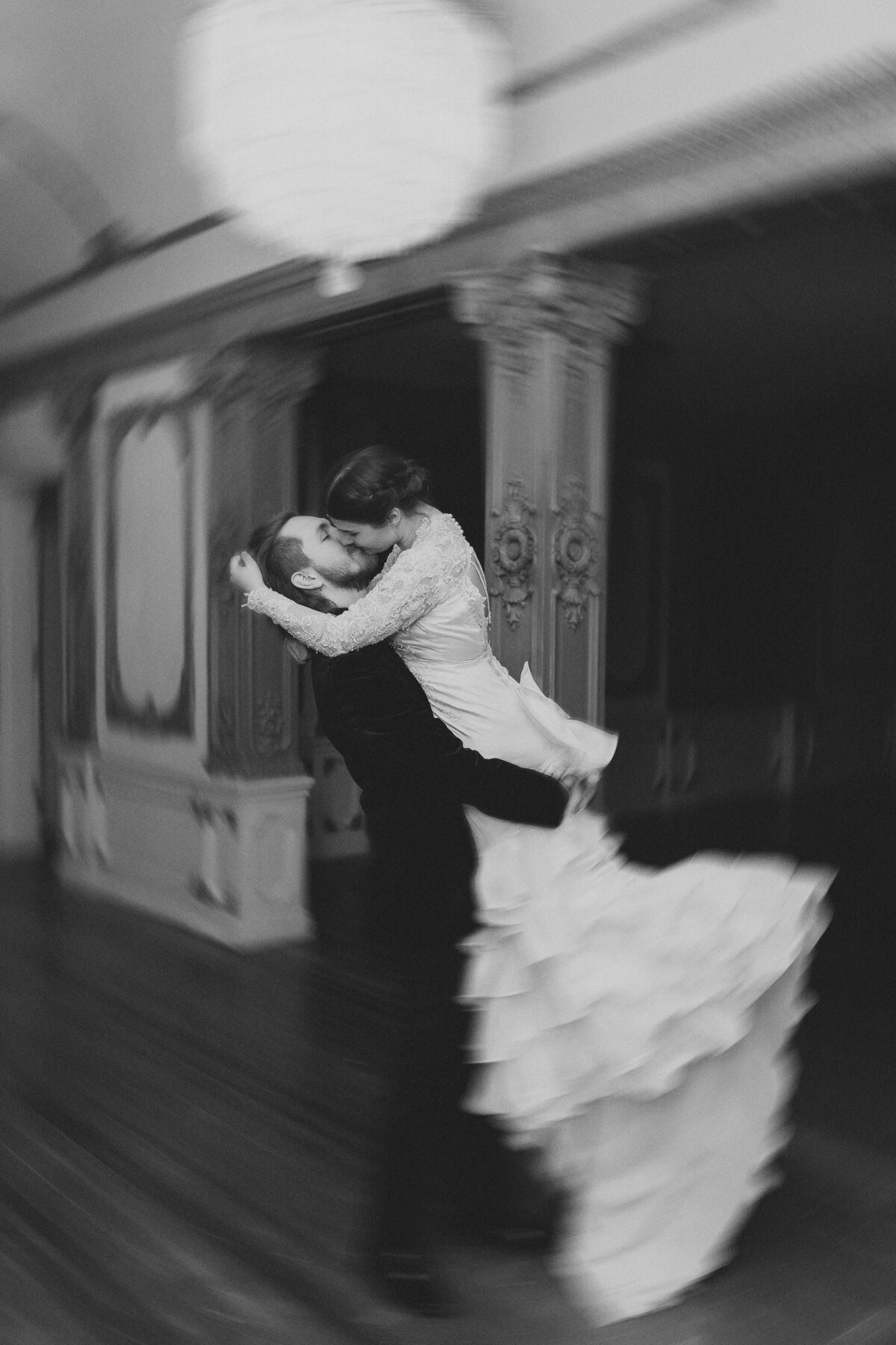 blurry black and white of bride and groom