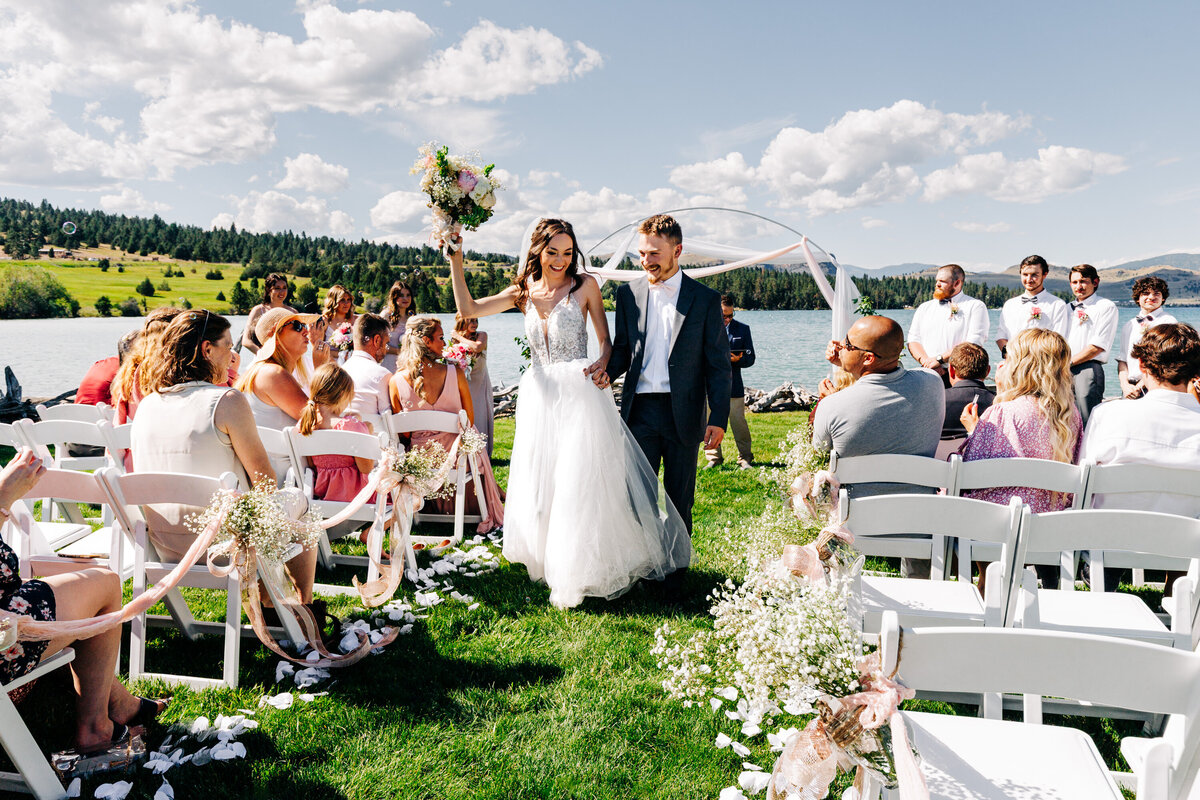 Bride and groom ceremony exit at Flathead Lake Forevers venue