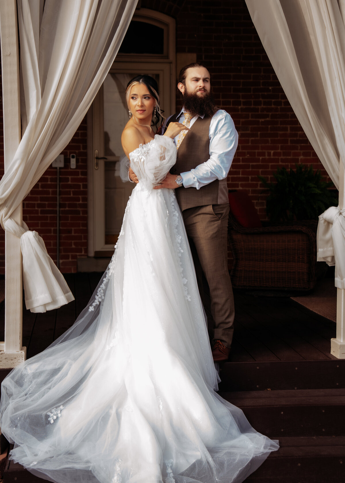 fine art wedding photography of posed couple on their wedding day at 1886 Farmhouse wedding venue Boone Iowa near Des Moines Iowa