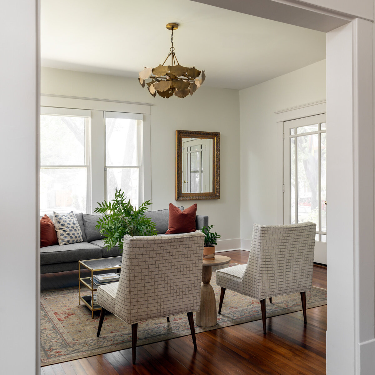 rebekah nicole interiors living room gold light fixture