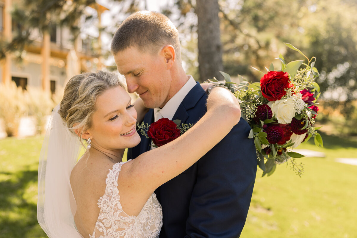 Bride and groom on wedding day in Alexandria Minnesota at Gathered Oaks Venue