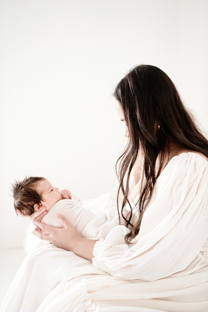 mom looking at baby