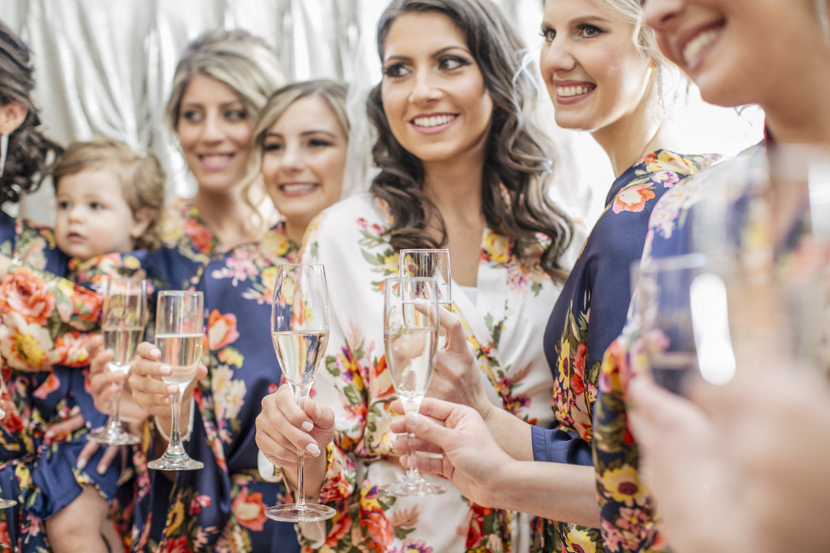 bridesmaids getting ready at clarks landing yacht club wedding