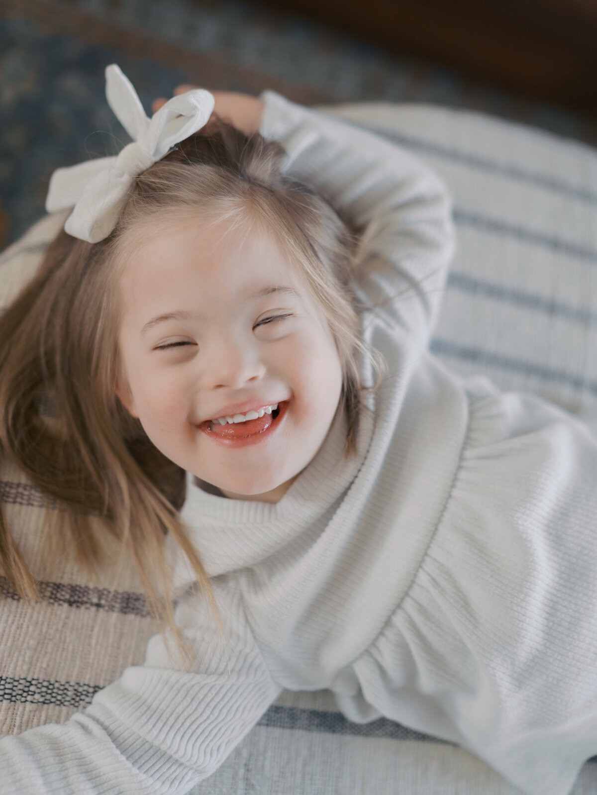 Girl smiling for Colorado Springs Family Photos by Colorado Photographer Lauren Bounds