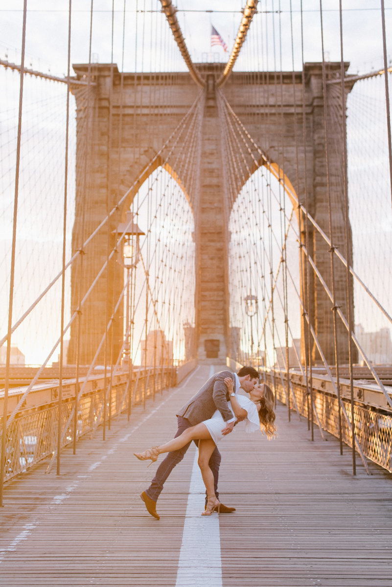 sunrise engagement brooklyn bridge dumbo city new york city nyc ny dramatic kiss dip engagement