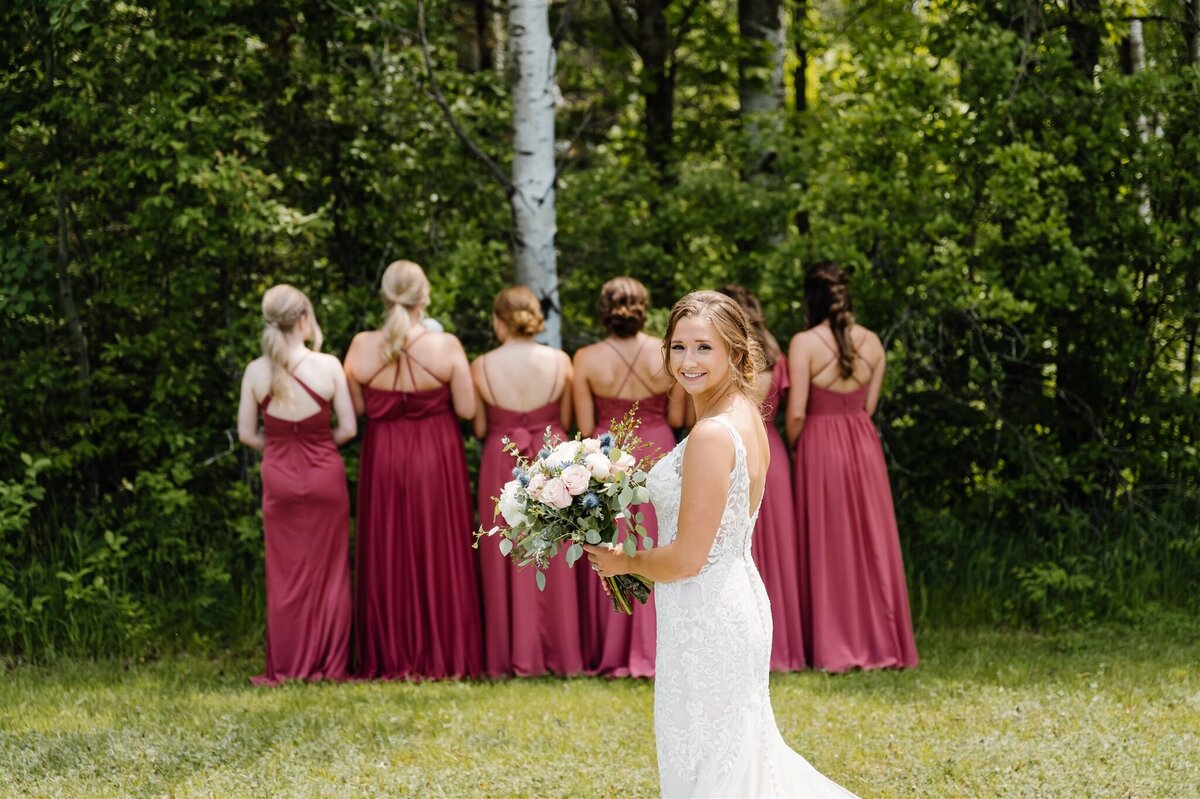 First look  with bridesmaids at The Bluebelle Event Venue in Bemidji Minnesota