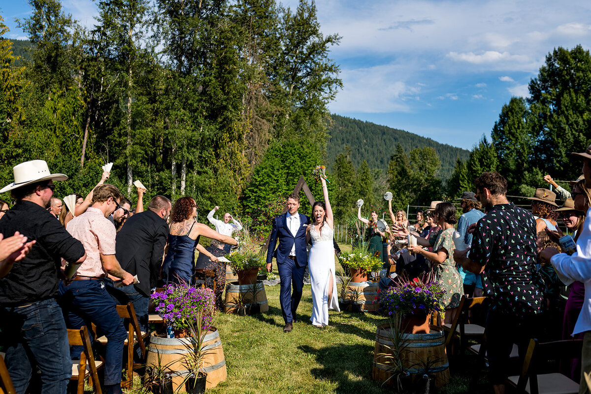 Officially husband and wife celebrations as they walk down the isle of their wedding ceremony in the townships QC