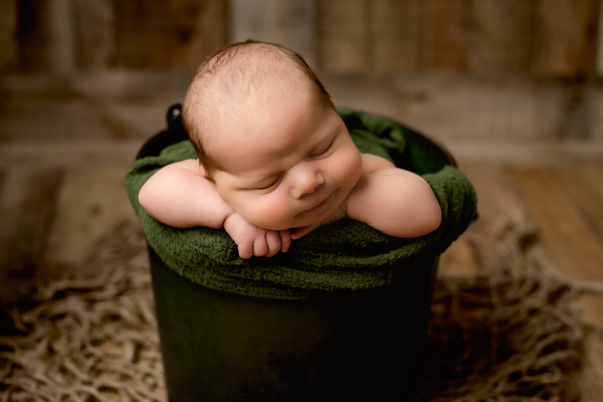 Baytown, Tx little baby boy in a bucket photoshoot