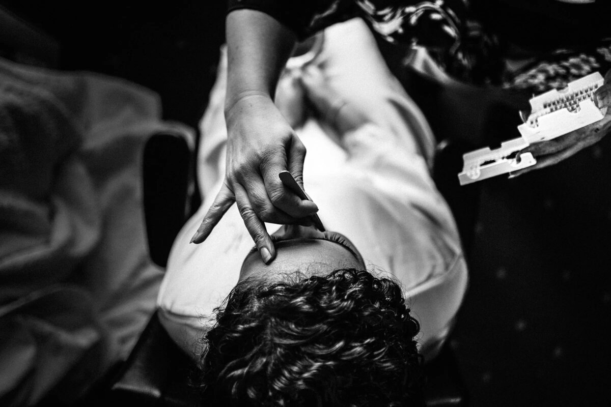 A bride getting her makeup done