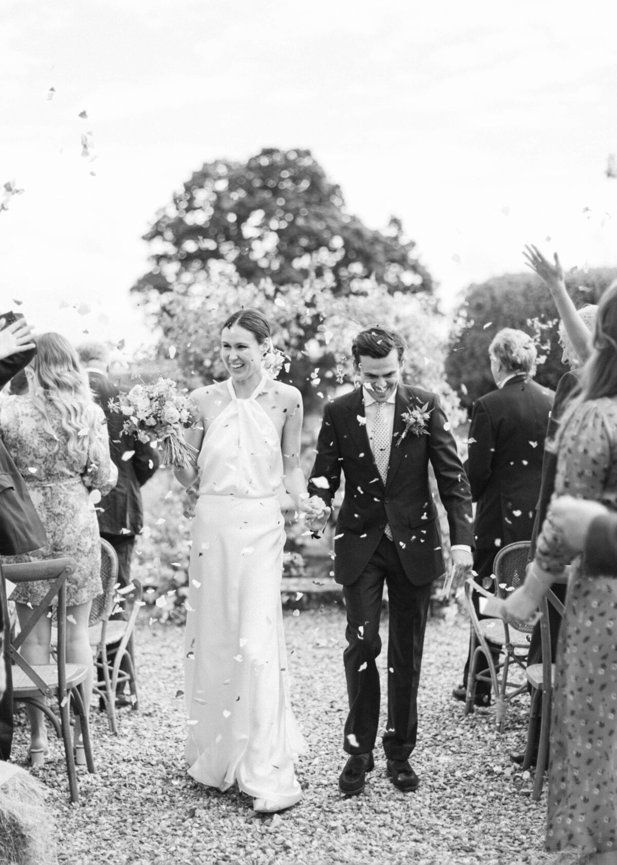 chloe-winstanley-weddings-outdoor-ceremony-halfpenny-confetti-black-white
