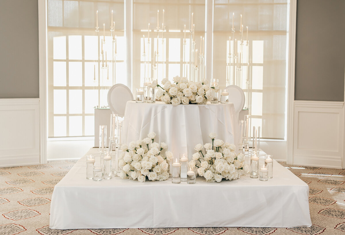 Elegant sweetheart table with white roses