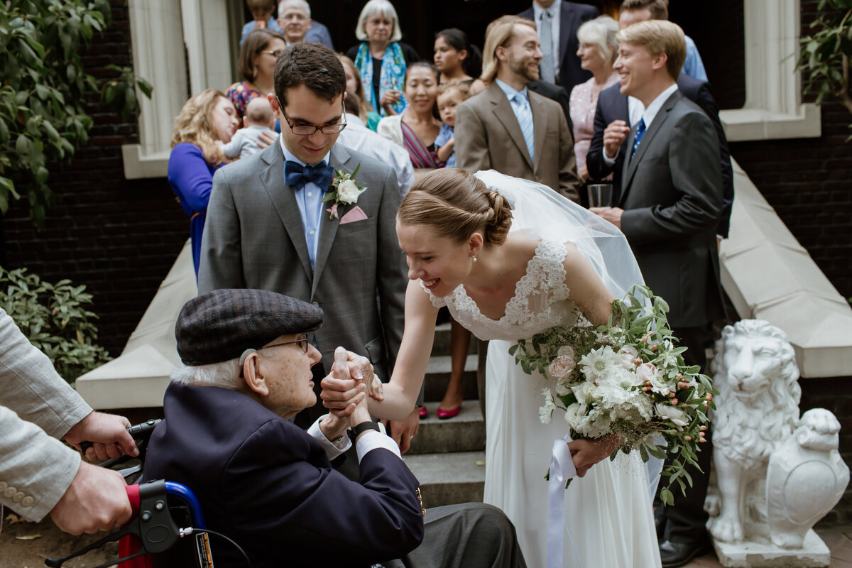 A sentimental candid moment between a bride and her grandfather. Captured by Fort Worth wedding photographer, Megan Christine Studio