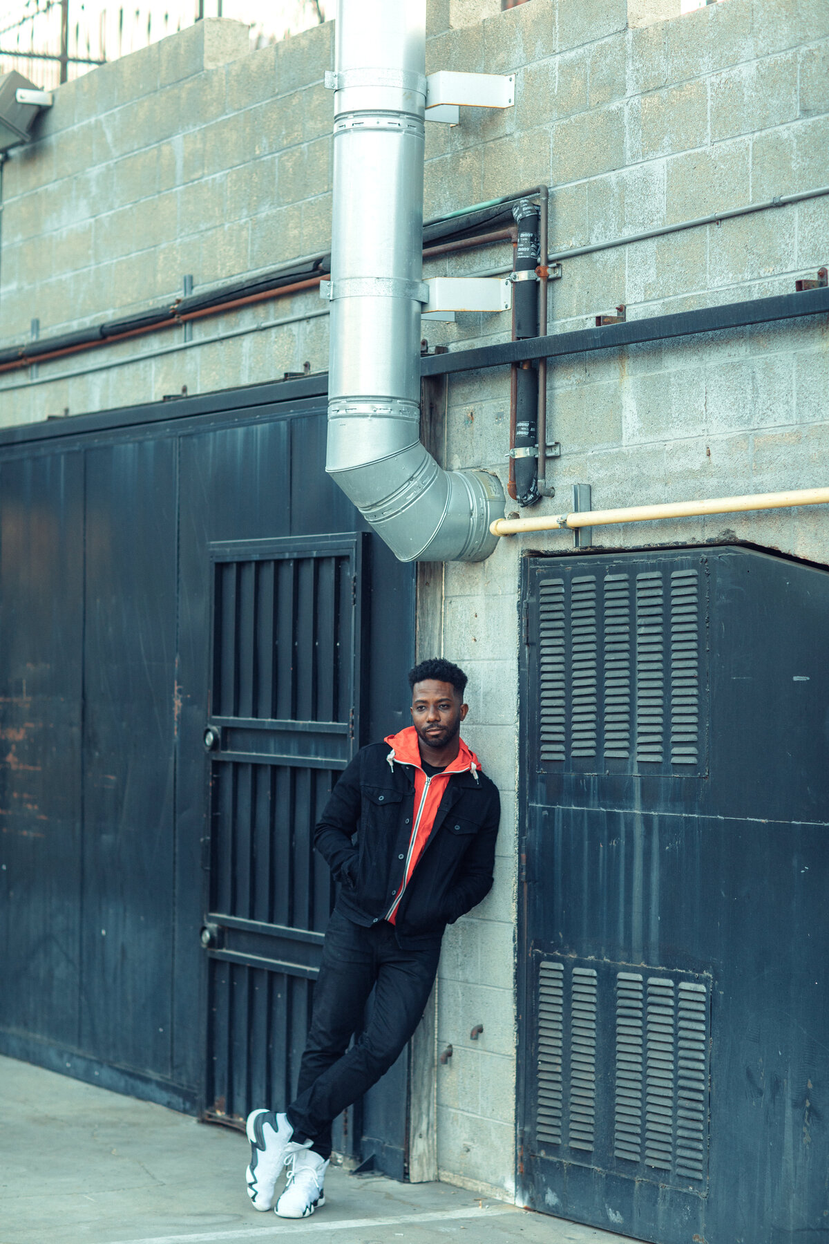 Portrait Photo Of Young Black Man In White Rubber Shoes Los Angeles