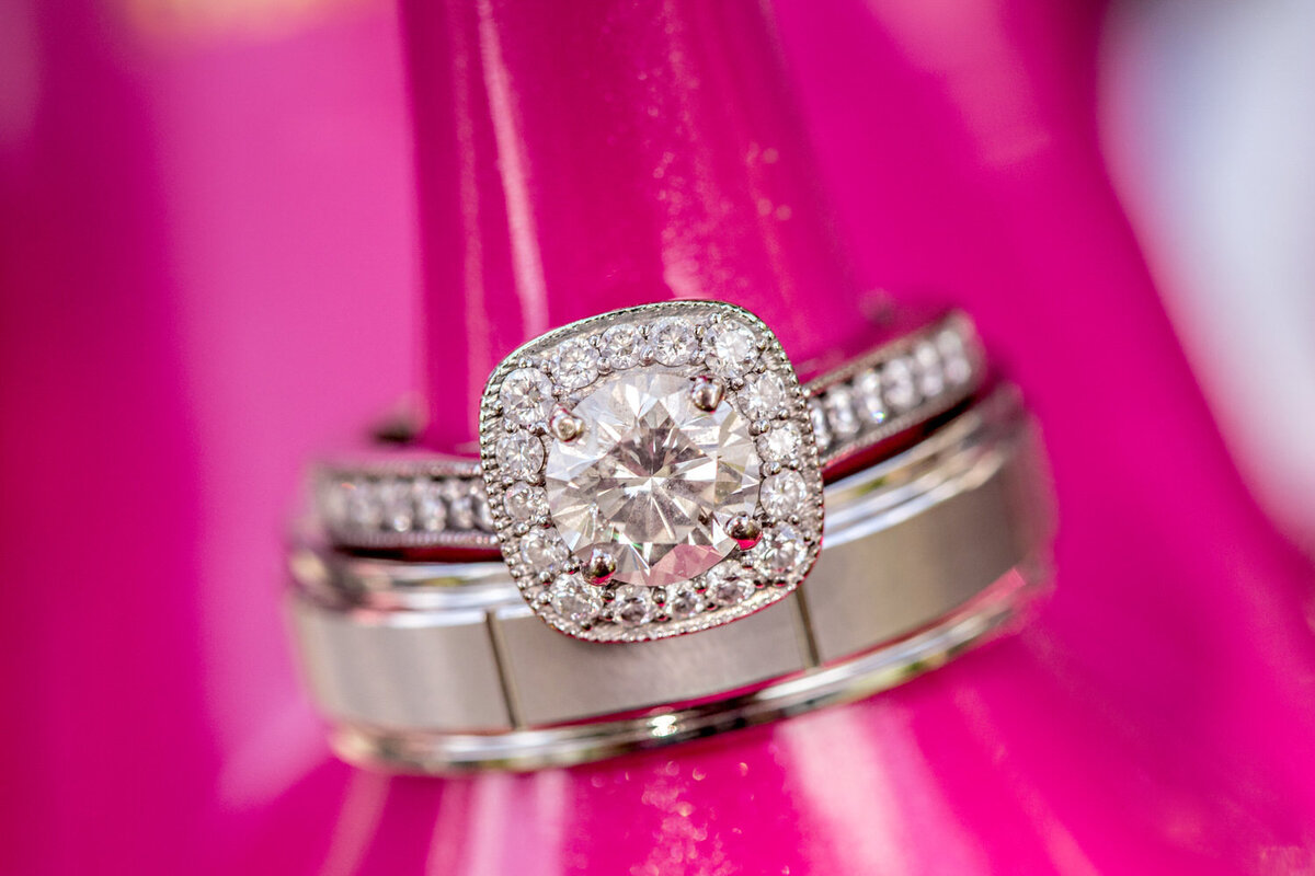 wedding ring on a hot pink background