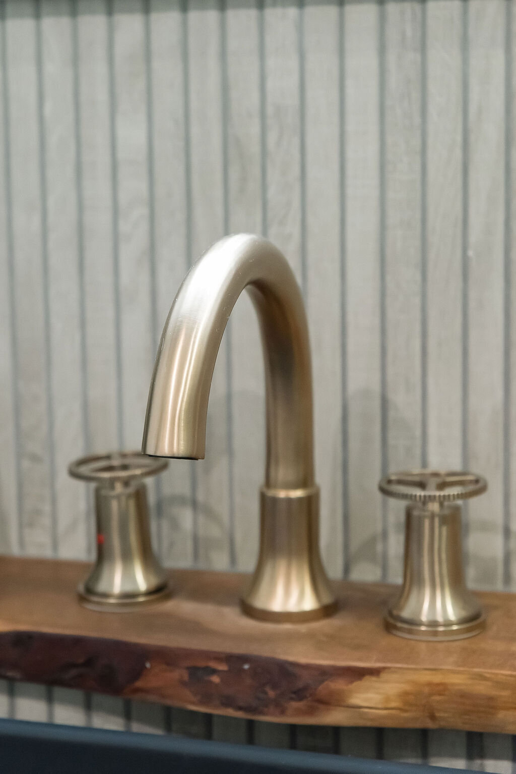 dewine design interiors hotel lux bathroom faucet gold finishings