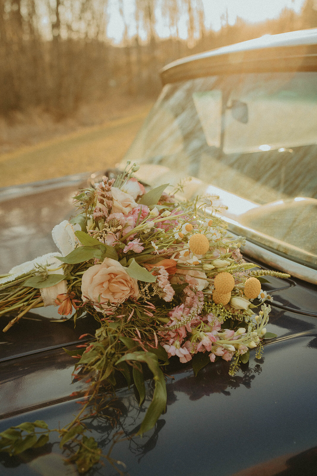jade-stephen-elopement-session-vintage-vehicle-wild-floral-arrangement-rachel-bond-photography