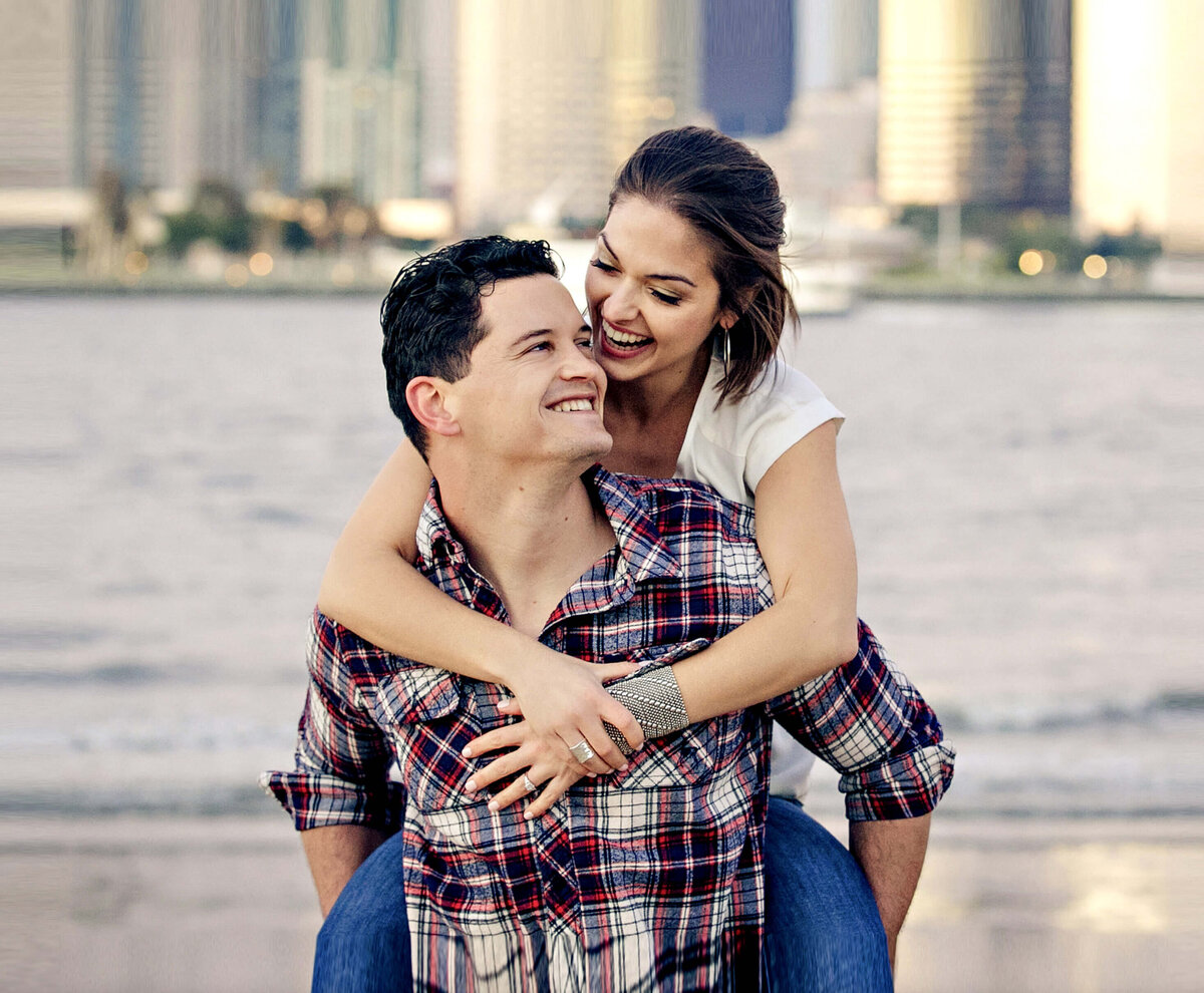 coronado-beach-engagement-photo-san-diego-skyline-couple-piggyback