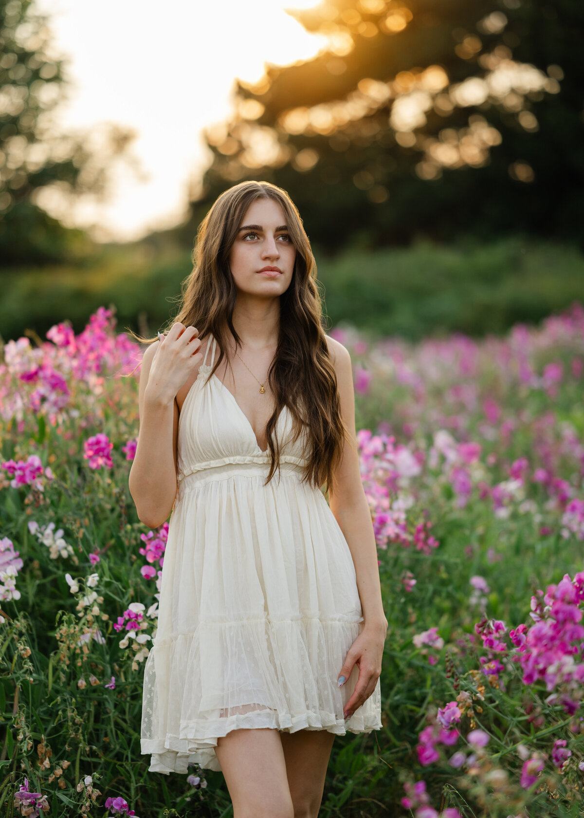 high school senior wildflower portrait sunset in white dress
