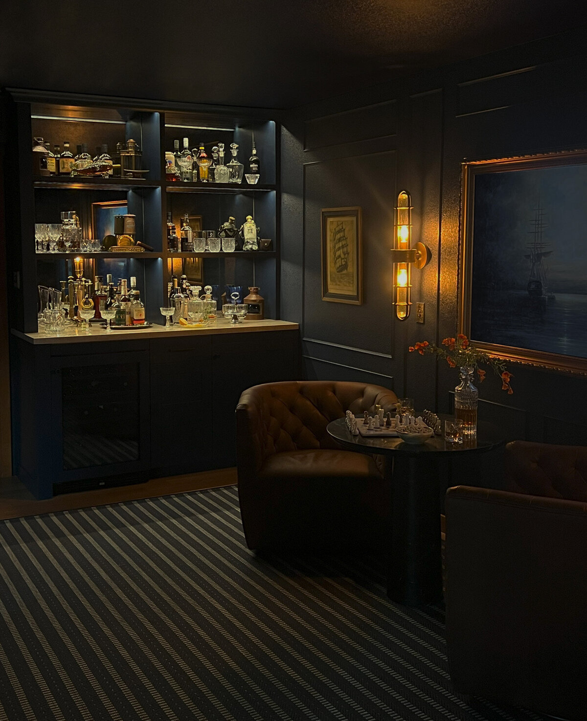 white sheet with floral shadows, whole lemon and half cut lemon, glass of water with lemon slices