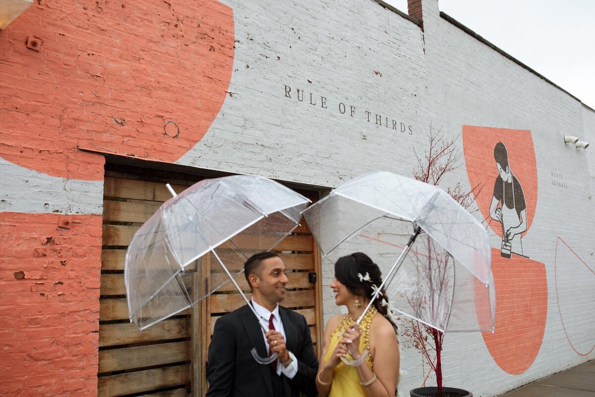 rule of thirds brooklyn rainy wedding with vintage dress and umbrellas