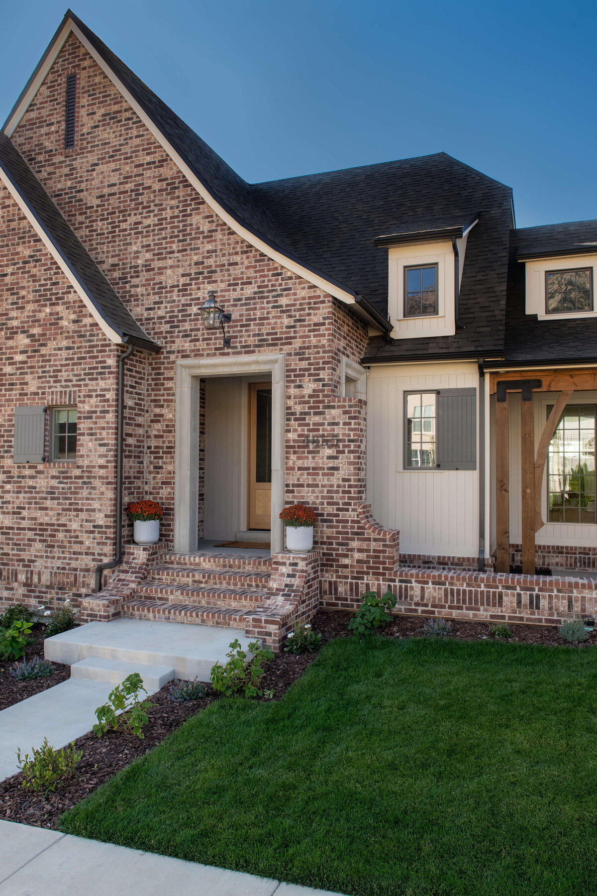 dutch-tudor-exterior-front-entry-with-brick-detailing