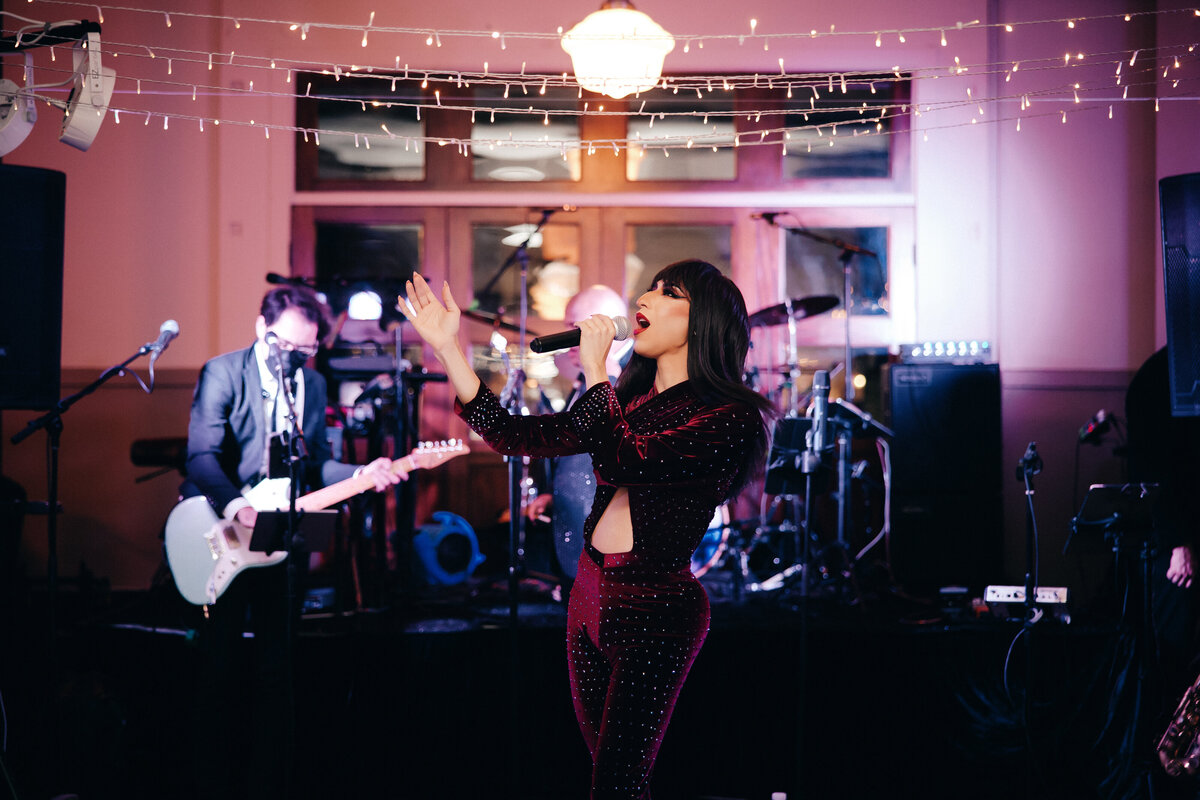 Drag queen performs at a LGBTQIA+ wedding reception.