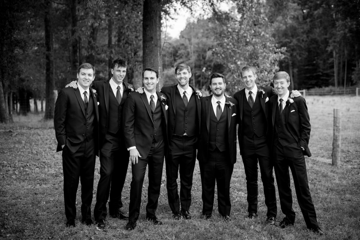 Groom and groomsmen portraits at a Rougemont, NC wedding