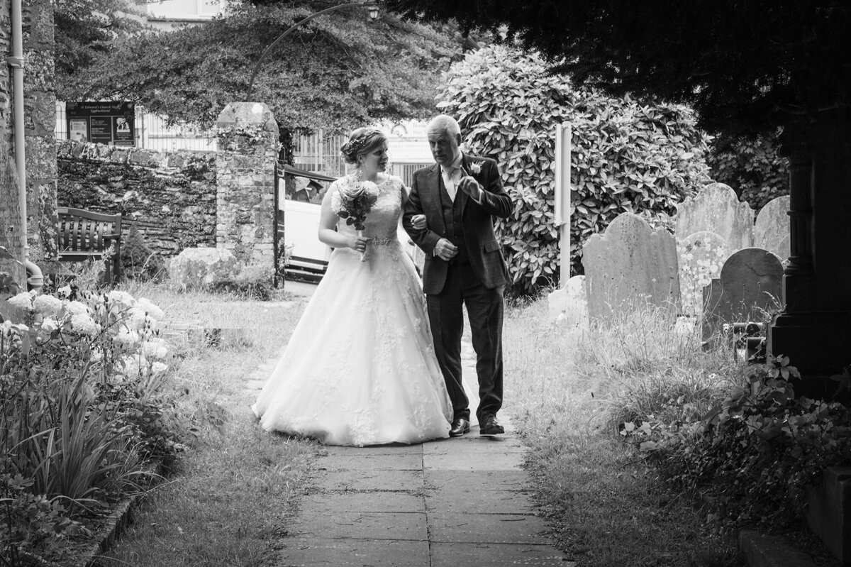 Bride & Bride father waalking to church
