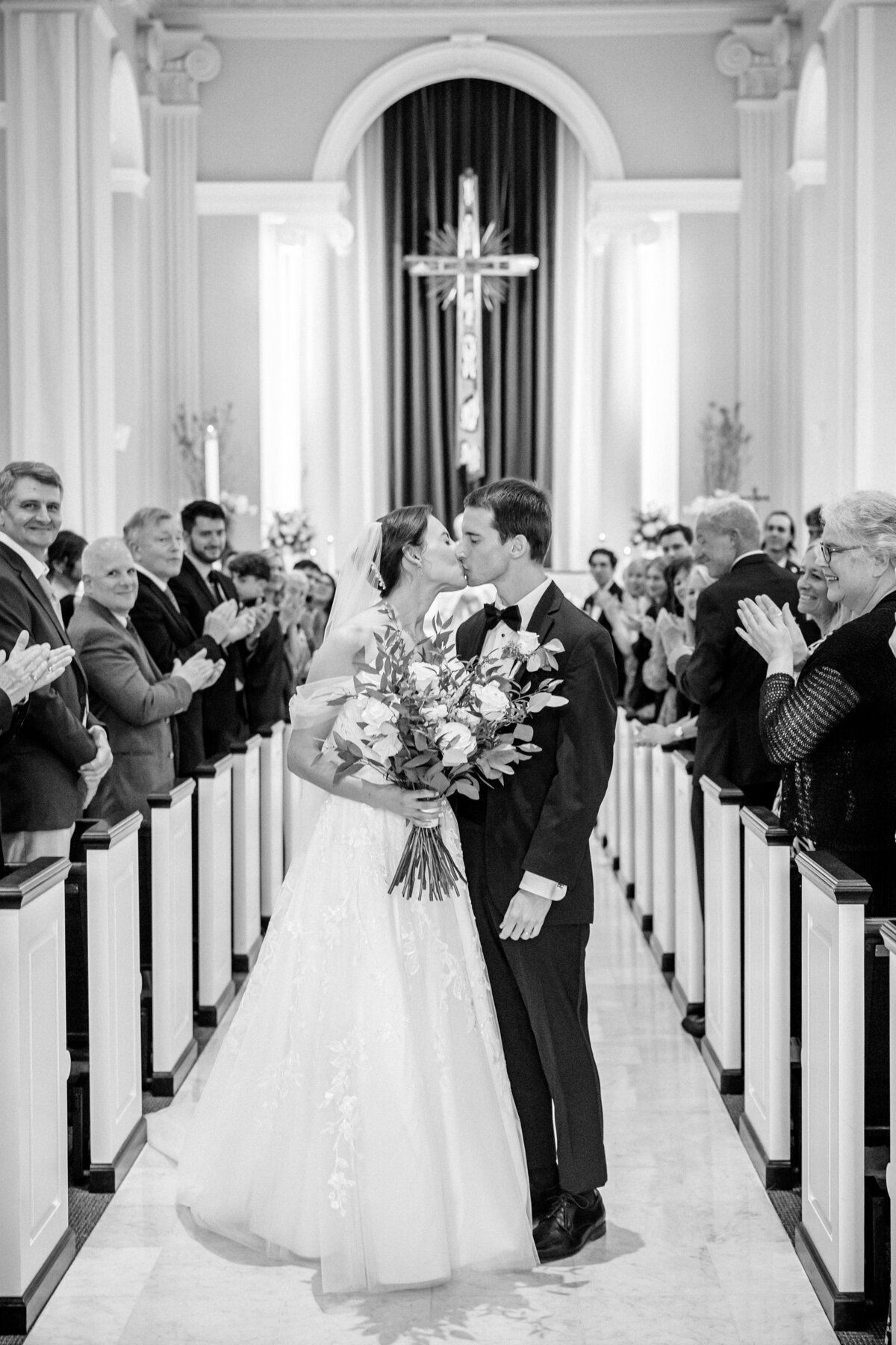 Atlanta Wedding Photographers | Bride And Groom Kissing AtClassic Church Wedding Ceremony