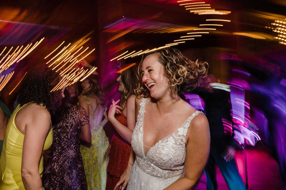 A bride dances during her wedding reception at Lacuna Lofts in Chicago Illinois