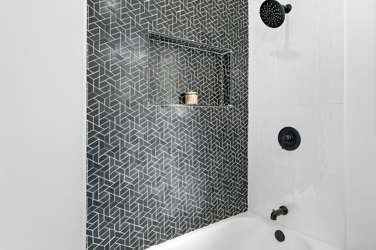 geometric-black-tile-shower-closeup-aw-development