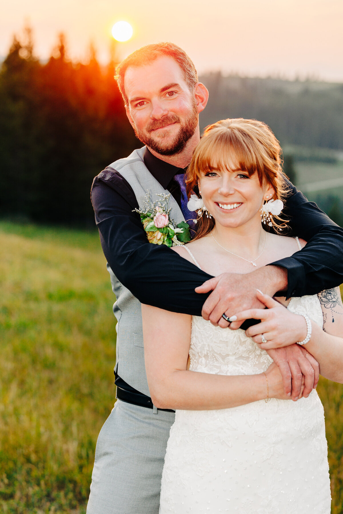 Sunset portrait of bride and groom at Headwaters Grille in Big Sky, MT