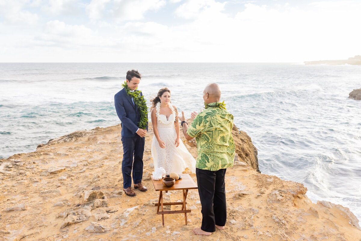 Stunning beach ceremony captured by a Kauai wedding photographer