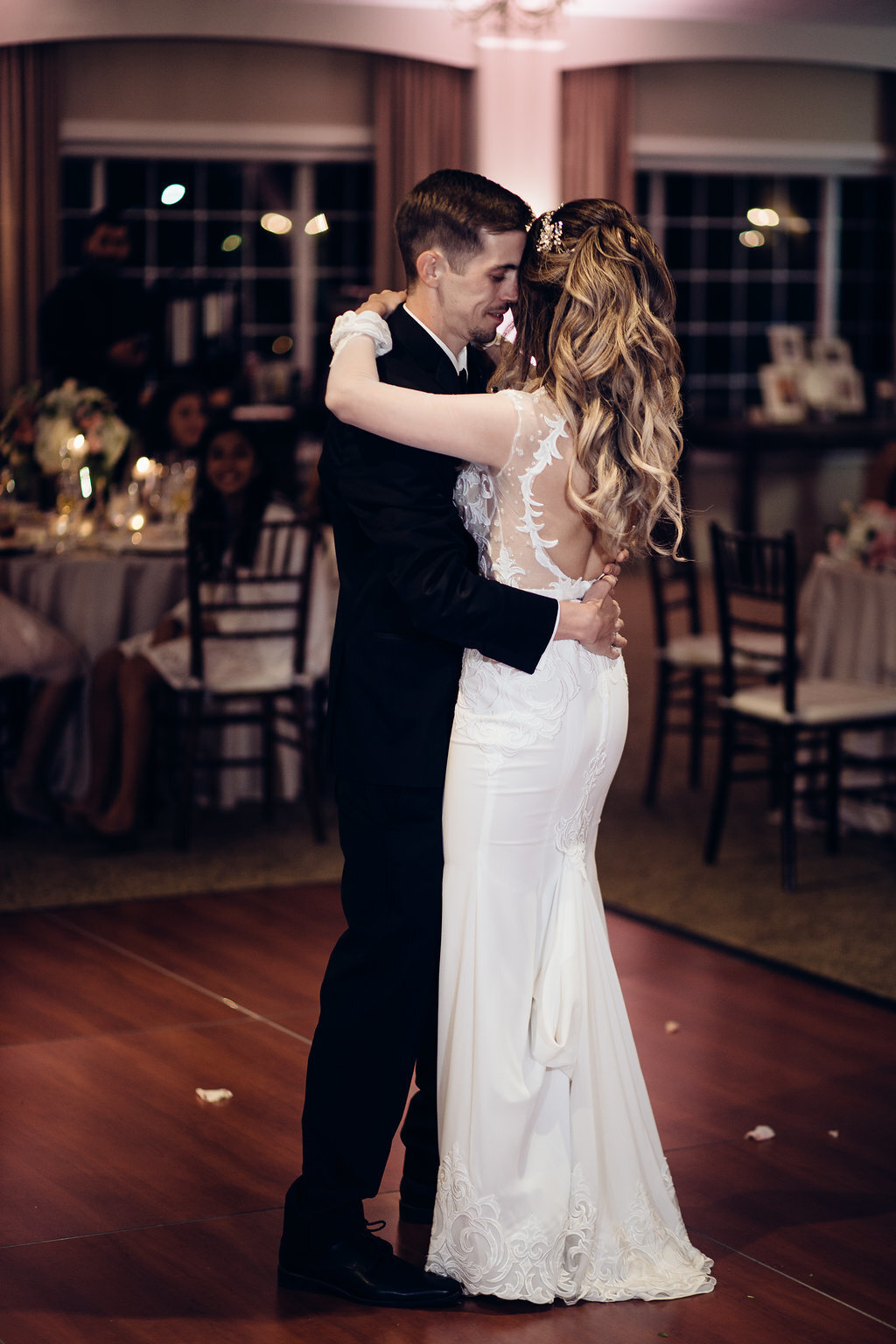 Wedding Photograph Of Bride And Groom Having Their Faces So Close While Dancing Los Angeles
