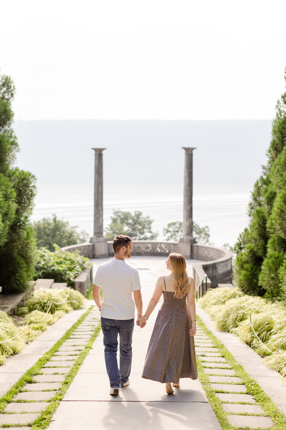 couple-walking-holding hands-Yonkers-garden-engagment-session