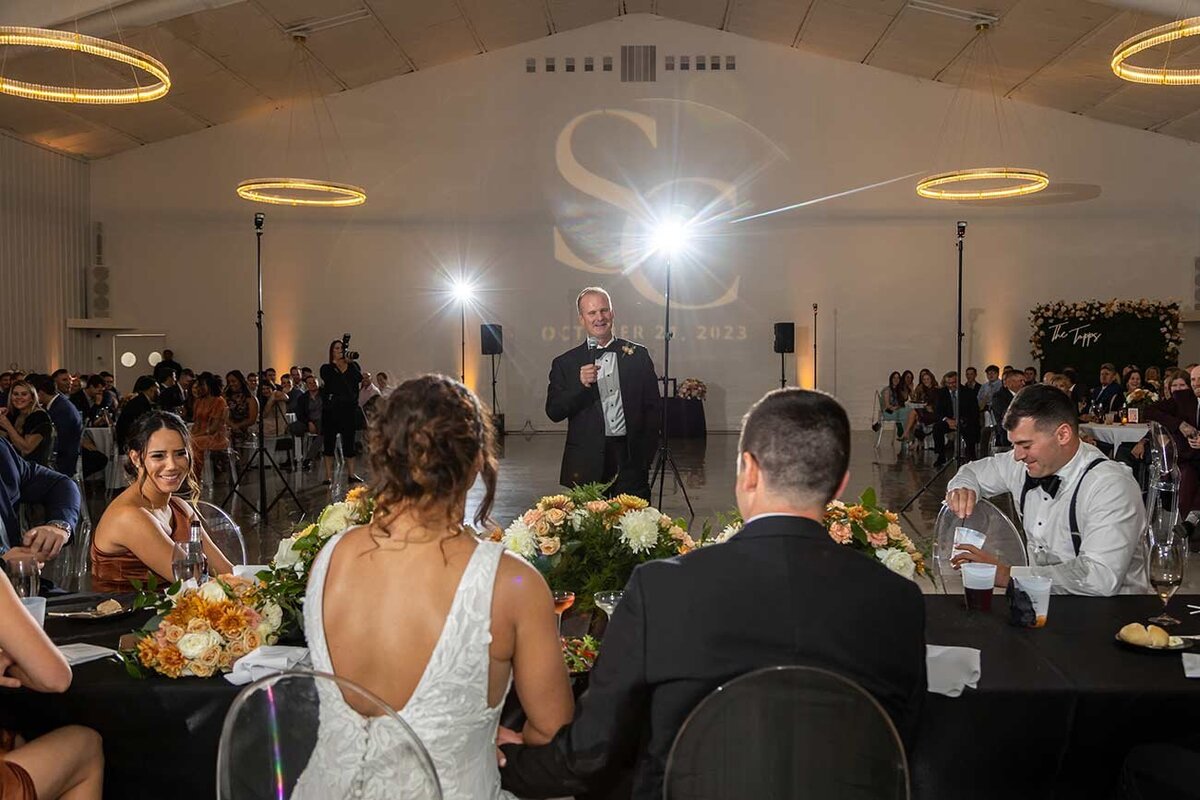 Father-of-the-bride-toast-at-wedding-reception