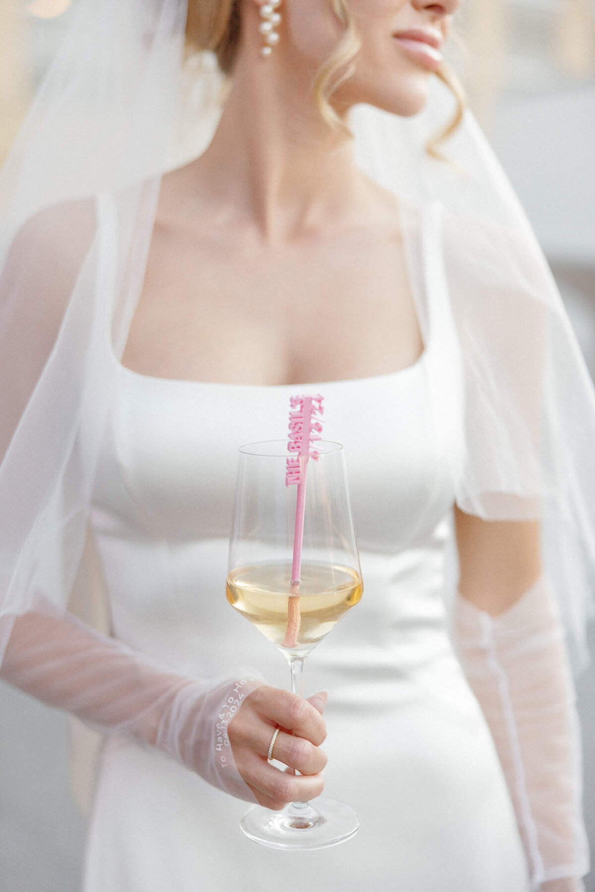 bride holding wine glass