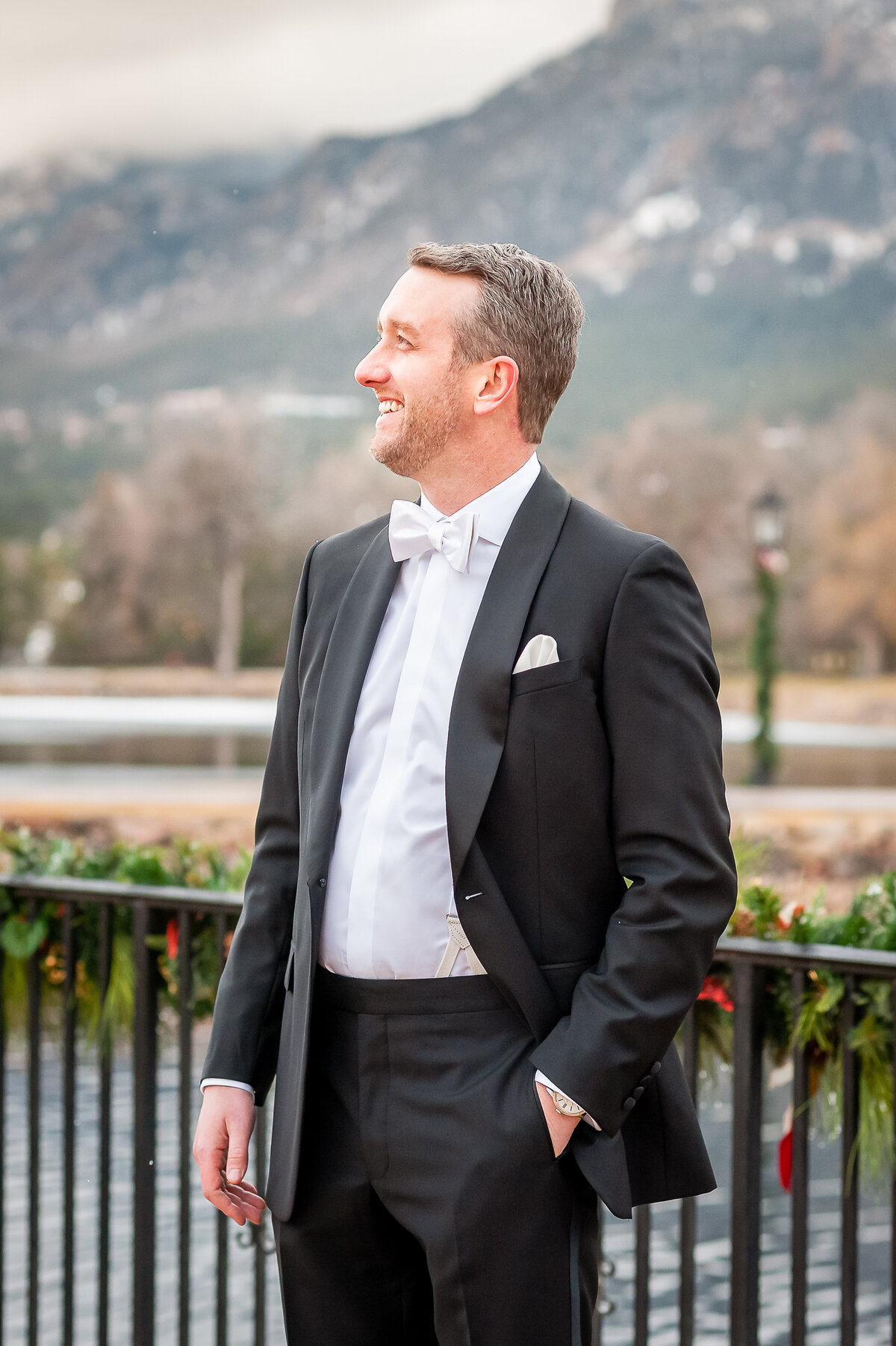A Groom Poses for a Photo at the Broadmoor