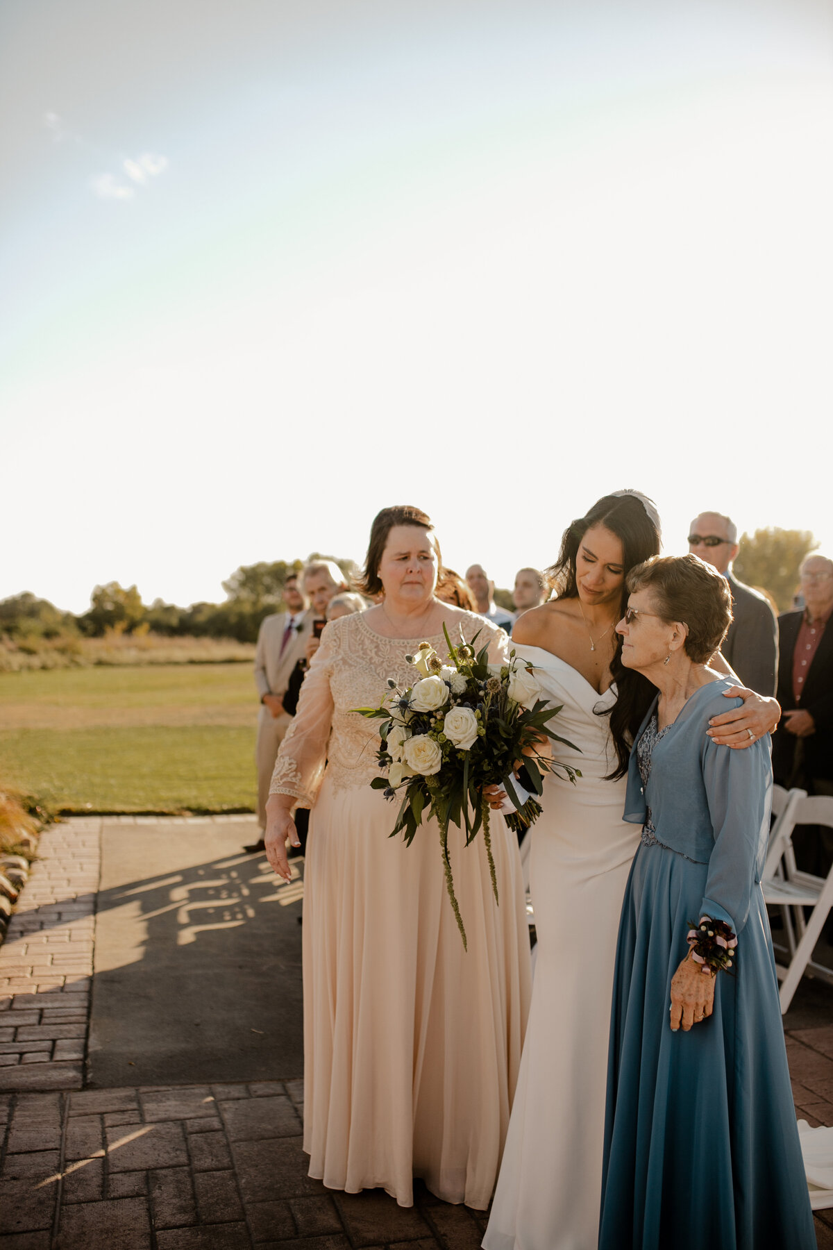 Elegant Bella Terre Vineyard wedding near Omaha, NE, blending luxury and rustic charm. Bride and groom celebrate amidst picturesque vineyard views and timeless architecture, captured by Tori Nichole Photography. A stunning setting for couples seeking a unique and sophisticated venue in the Omaha and Iowa region.