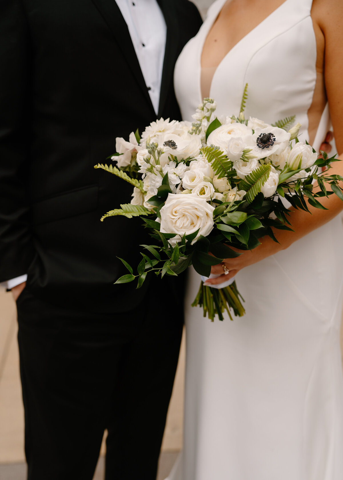 bride-groom-details-with-bouquet