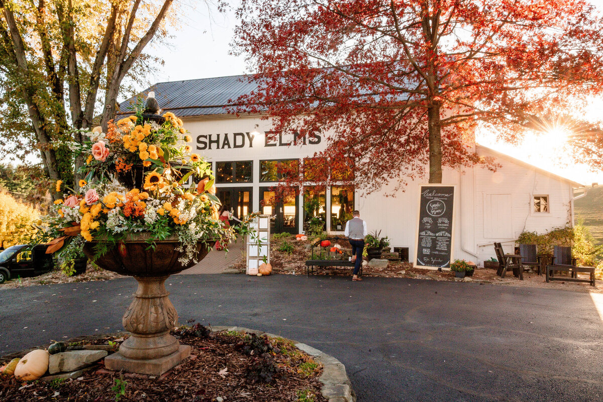 exterior photo of beautiful wedding reception barn at shady elms farm
