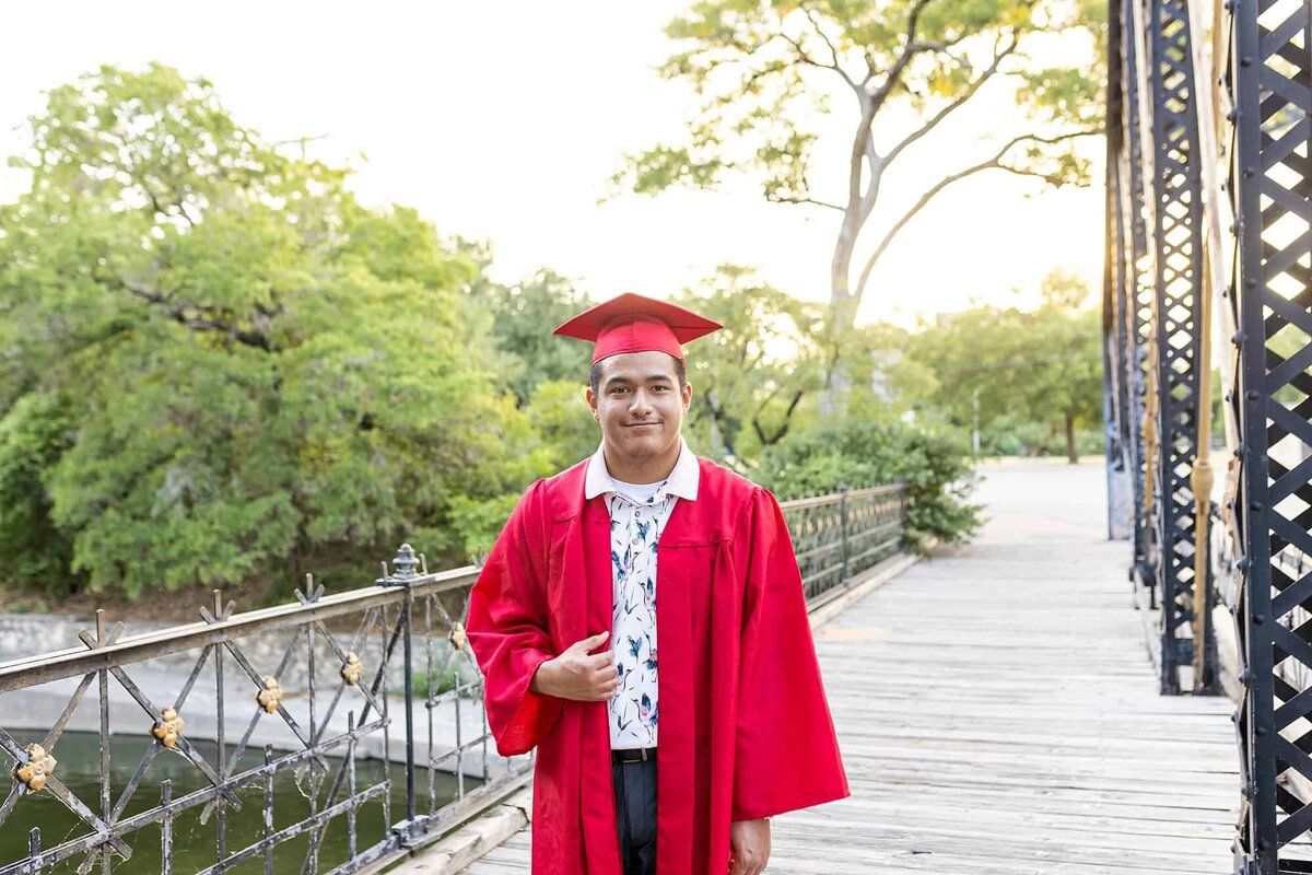 Senior boy in graduation cap and gown